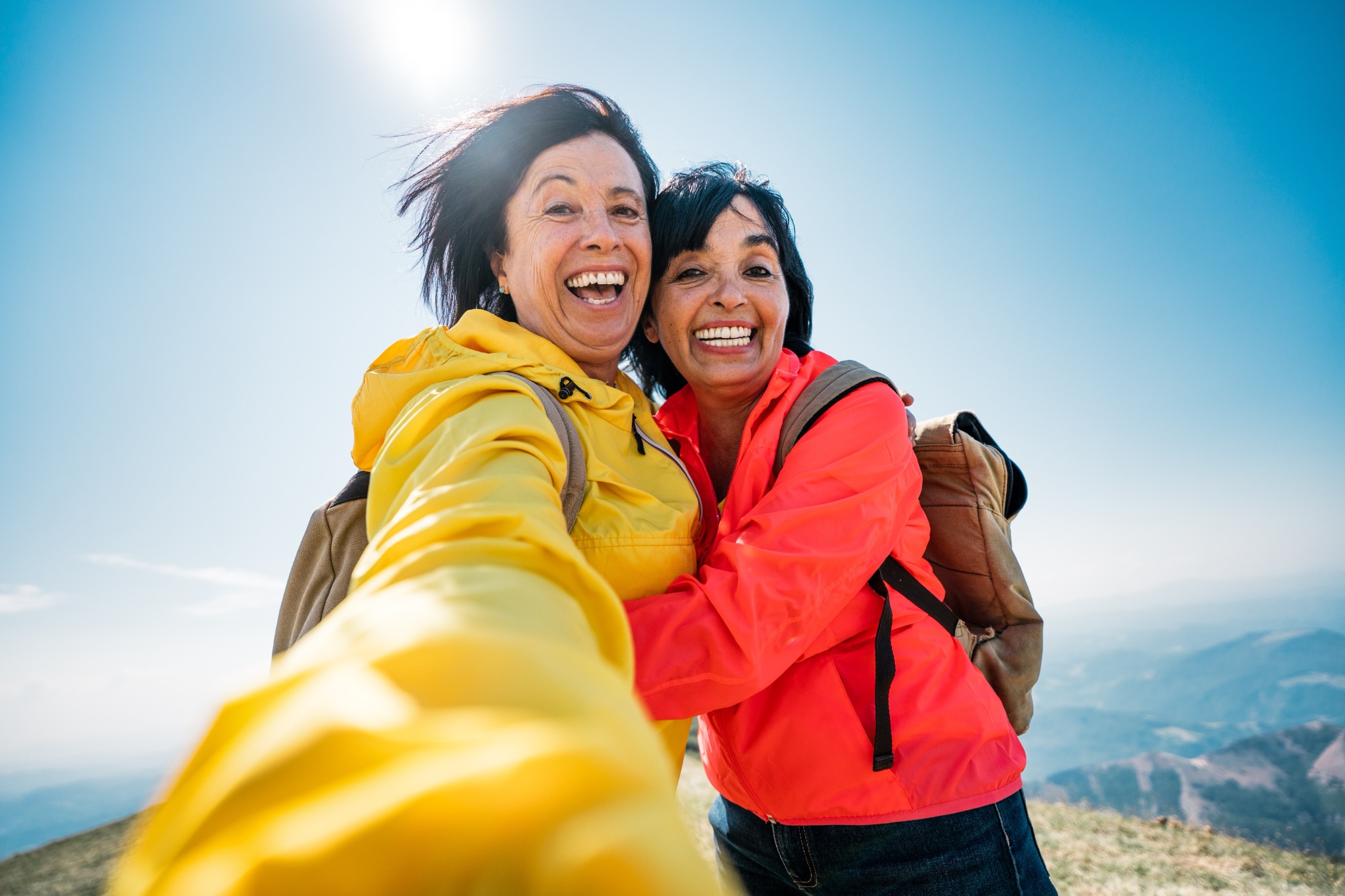 Two women enjoying a mountain hike together